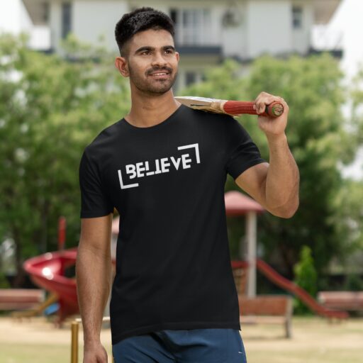 ‘Believe’ Motivational Quote Black Tshirt mockup of a cricket player wearing a round neck t shirt on a field m39969